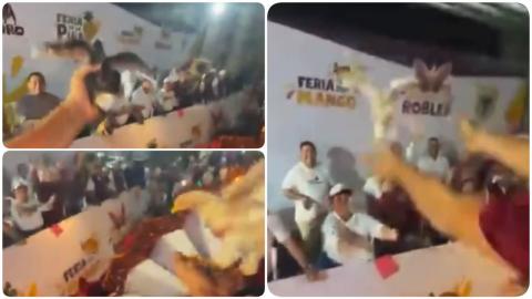 Maltratan y arrojan pollos vivos a alcalde en feria de Medellín de Bravo